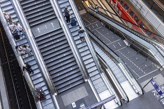 Escalator and staircase and travellers at Berlin Central Station