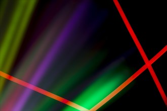 Red neon lines colorful laser light dark background