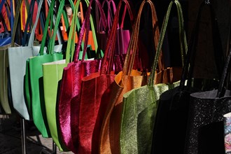 Colourful bags at the market in San Gimignano