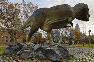 Reconstruction of a Tyrannosaurus rex in the Senckenberganlage with the Messeturm in the background