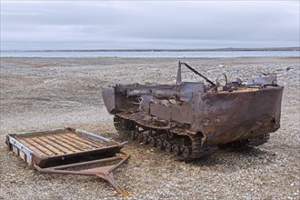 Rusty amphibian vehicle at deserted 1950s Kinnvika Arctic research station