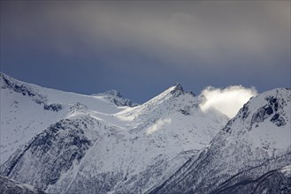 Snow covered mountain peak in winter
