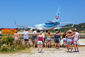 A TUI Boeing 737-800 aircraft with the registration G-TAWX at Skiathos Airport