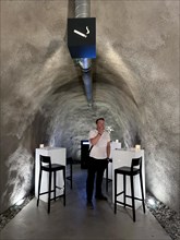 Man Smoking in Smoke Zone in an Underground Tunnel in Switzerland