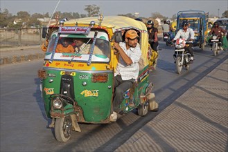 Fully loaded autorickshaw
