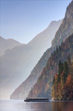 Tourist boat on Lake Koenigssee in autumn in the Berchtesgaden National Park