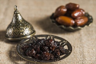 Ramadan concept with dates raisins