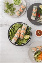 Top view fresh shrimp rolls with salad sauce