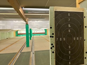Modern Shooting Range with Target in an Illuminated Underground Tunnel in Switzerland
