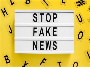 Stop making fake news letters background