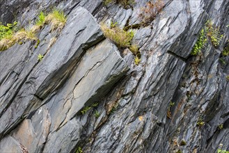 Rock layers in cliff made of slate at the Ballachulish slate quarry in Lochaber