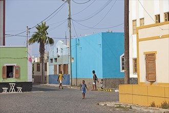 Street with colourful houses at the fishing village Palmeira on the island of Sal