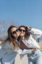 Women wearing sunglasses outdoors
