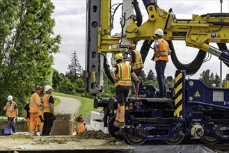 A railway junction is converted to ETCS digital safety technology for the first time. Track foundation train drills holes for the foundations of new signalling frames