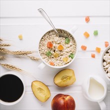Healthy breakfast with oatmeal white table