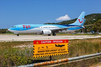 A TUI Boeing 737-800 aircraft with the registration G-FDZS at Skiathos Airport
