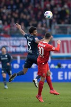 Fernandes DA SILVA JR. VFL Bochum in aerial battle with Tim KLEINDIENST 1. FC Heidenheim re