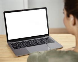 Close up woman using laptop