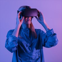 Woman wearing virtual reality gadget