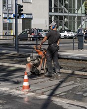 Road construction site next to a tram station
