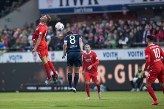 Adrian BECK 1. FC Heidenheim left in aerial battle with Anthony LOSILLA VFL Bochum