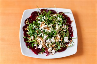 Beetroot carpaccio with feta cheese and rocket