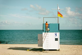 Lifeguard on a lookout tower