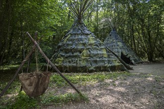 Replica of open air dwelling with tents made of animal hides from the Magdalenian period at Prehisto Parc