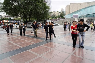 Residents of Chongqing dancing in the centre