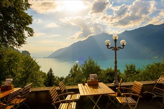 Restaurant Terrace View from The Historical Grandhotel Giessbach with View over Mountain and Lake Brienz with Sunlight in Bernese Oberland