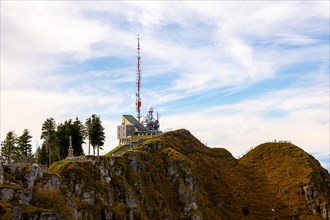 Beautiful Meteorological and Communication Station with Trees on Mountain Peak in a Sunny Day in Monte Generoso