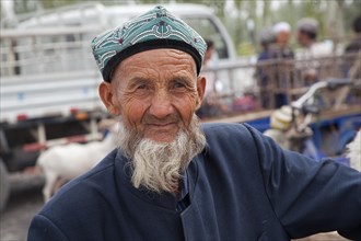 Portrait of man with beard of the Uighur tribe in Kashgar