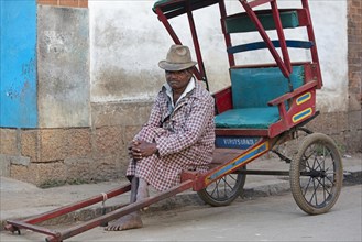 Old Malagasy pousse-pousse driver