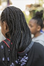 Young girl with black braids