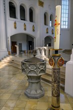 Baptismal font and candle