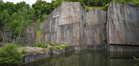 The abandoned red marble quarry Carriere de Beauchateau at Senzeilles in the Belgian Ardennes