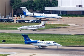 Embraer Phenom 300 and Gulfstream G550 private jets at Dallas Airport