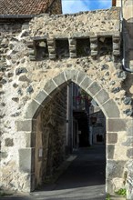 Saurier. Medieval entrance of village. Puy de Dome department. Auvergne-Rhone-Alpes. France
