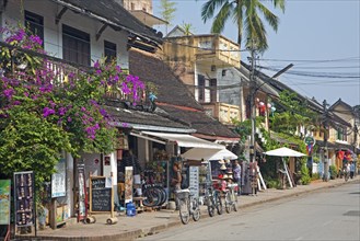 Shops renting mountain bikes for tourists and touring offices in the main street at Luang Prabang