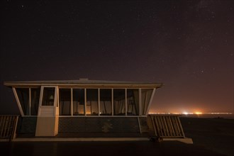 Pelican Point lighthouse with starry sky
