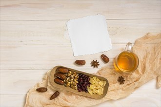 Dried fruits with walnuts paper tea