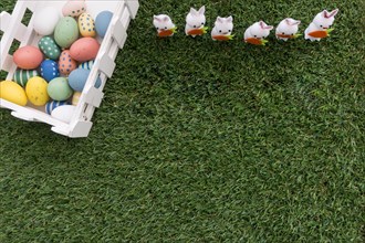 Easter eggs rabbits grass surface