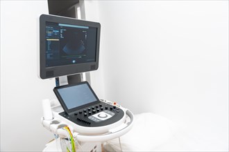 Cardiology clinic with a new ultrasound machine for echocardiogram exams to clients