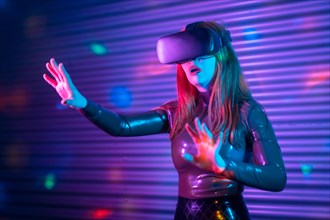 Futuristic woman gesturing while wearing VR goggles in an urban night space with neon lights