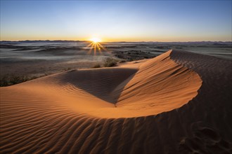 Sunset in a dune landscape