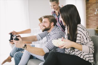 Cheerful people playing game party