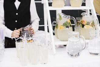 Fresh lemonade with straws table