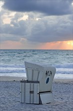 White beach chair in the evening sun