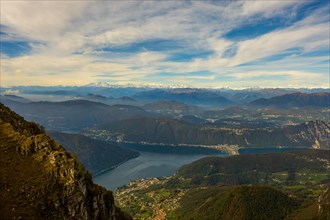 Aerial View over Beautiful Mountainscape with Snow Capped Monte Rosa and Mountain Peak Matterhorn and Lake Lugano in a Sunny Day From Monte Generoso