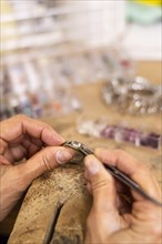 Creating ring hard working jeweler concept